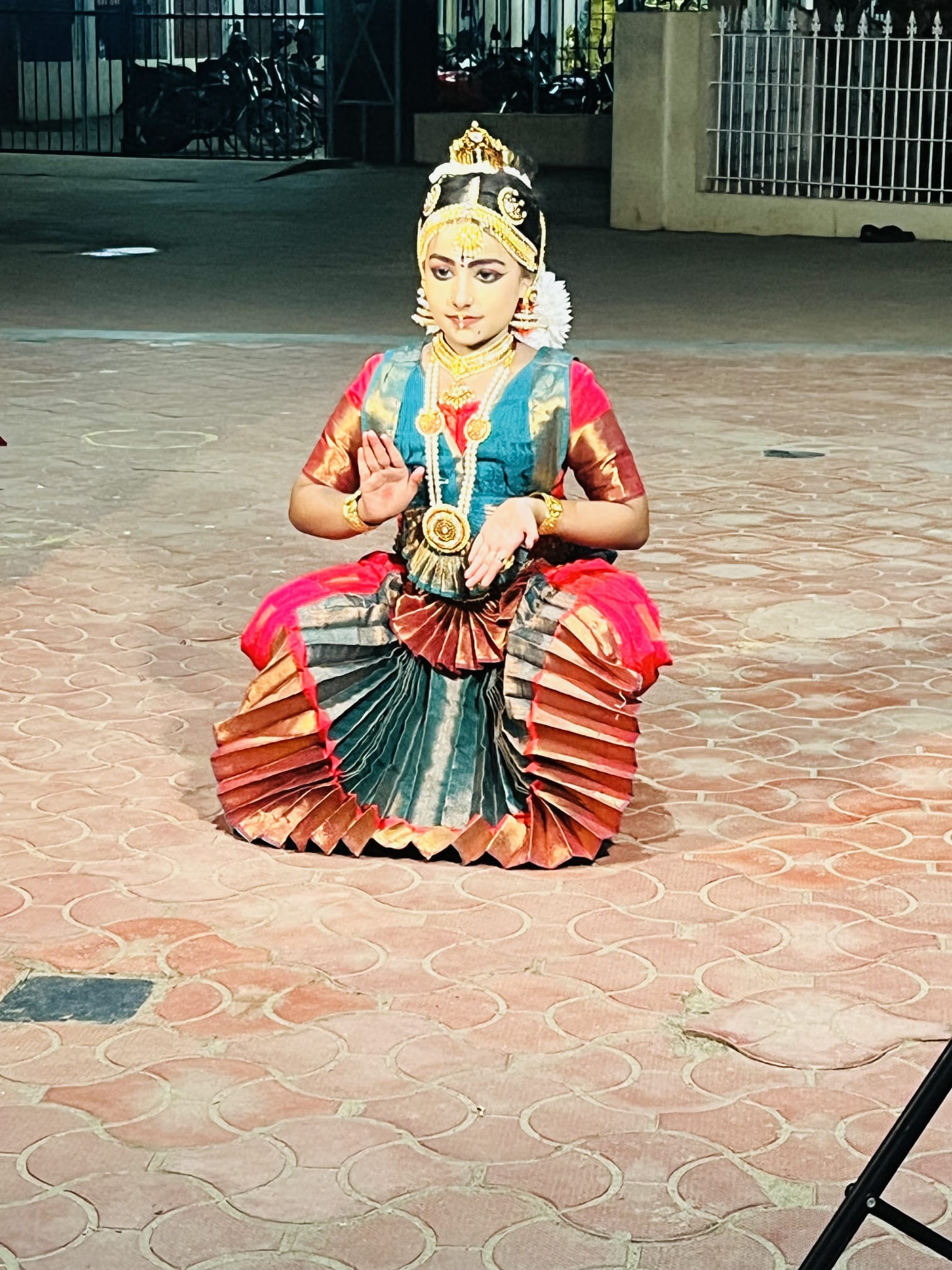 Young Bharatanatyam performer in traditional costume